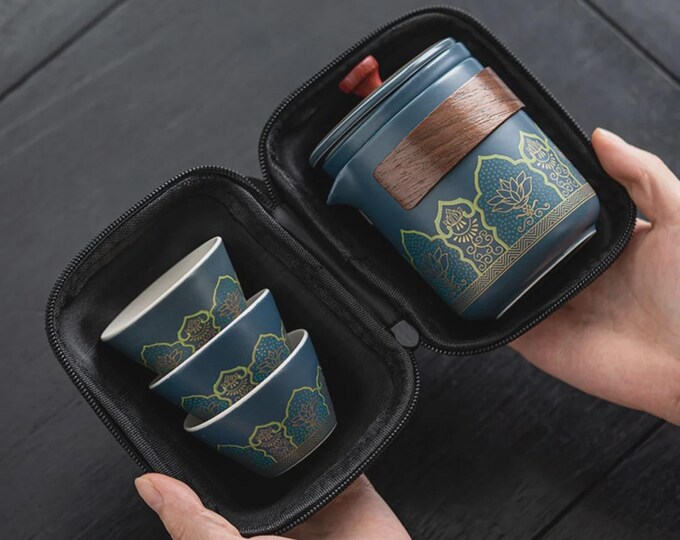 Travel quick-brew tea set with a lotus motif in a zip-up case